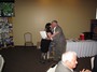 Past-President Sarah Lamothe hands over the reigns (and an award) to President Bob Smith
